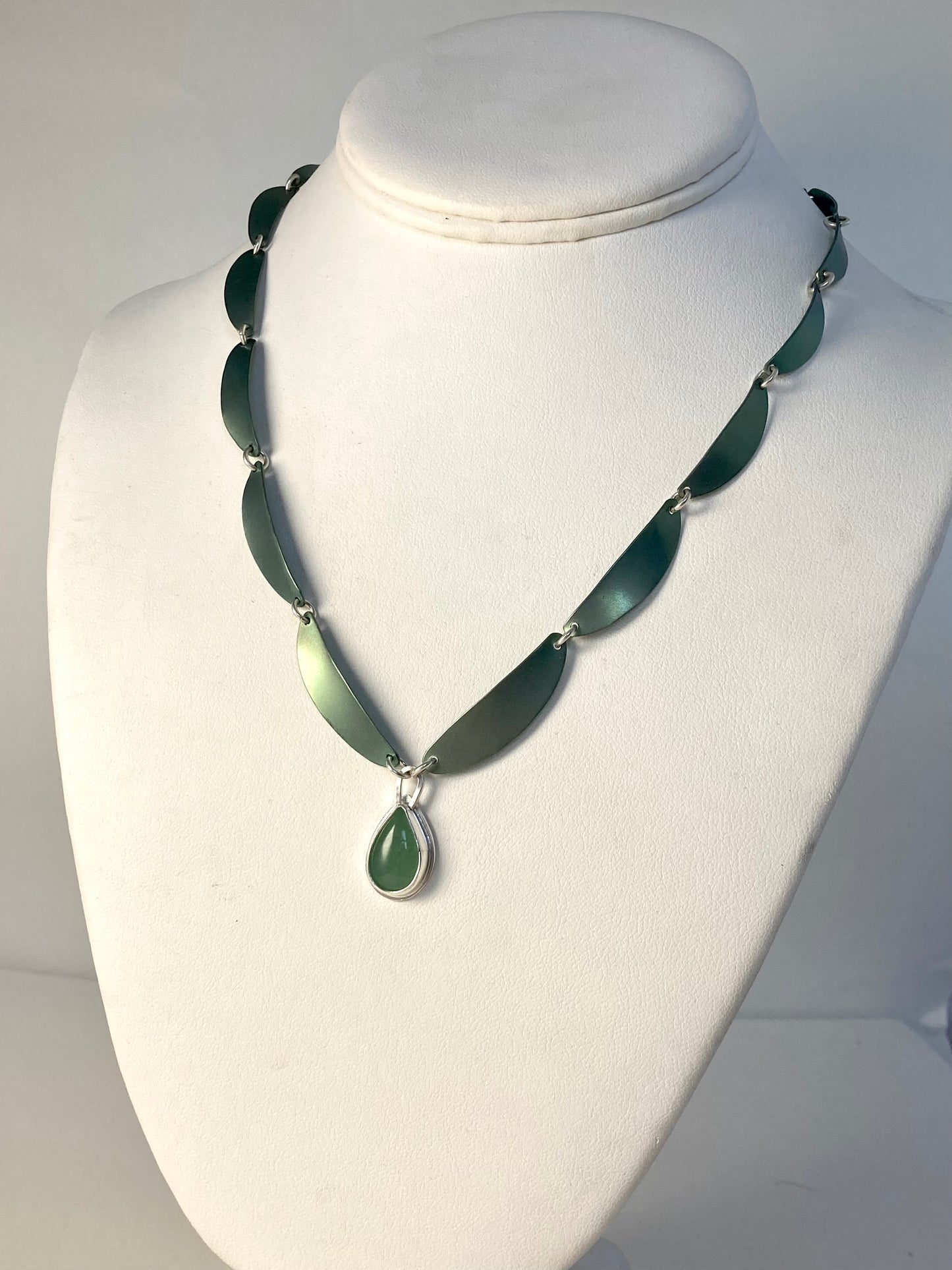 Aventurine pendant on Green Titanium ribbon necklace